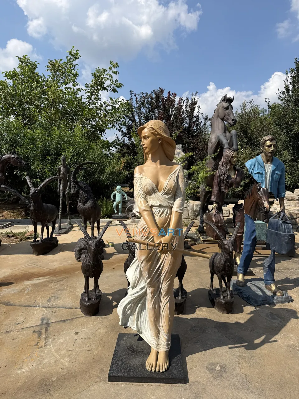 Standing Woman Holding Flute Sculpture — product photograph 3 showing the reference form and finish
