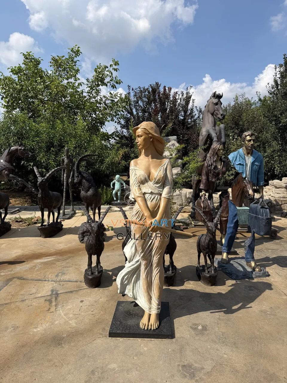 Standing Woman Holding Flute Sculpture — product photograph 2 showing the reference form and finish