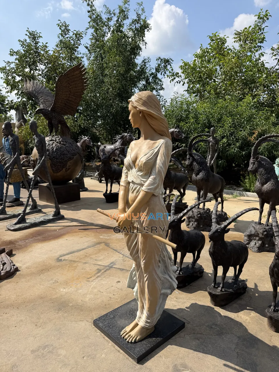 Standing Woman Holding Flute Sculpture — product photograph 5 showing the reference form and finish