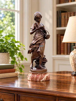 Reading Girl with Basket Sculpture